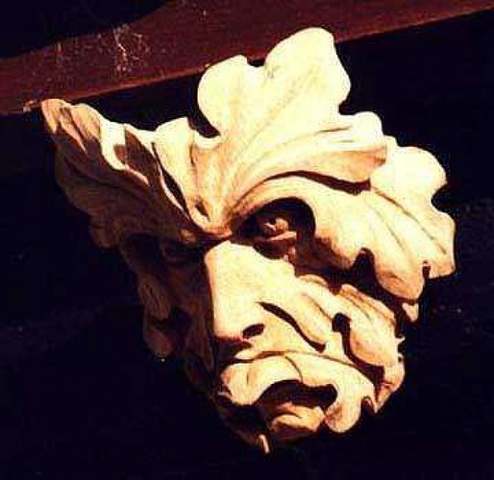 Green Man with tongue. Oak H 7in